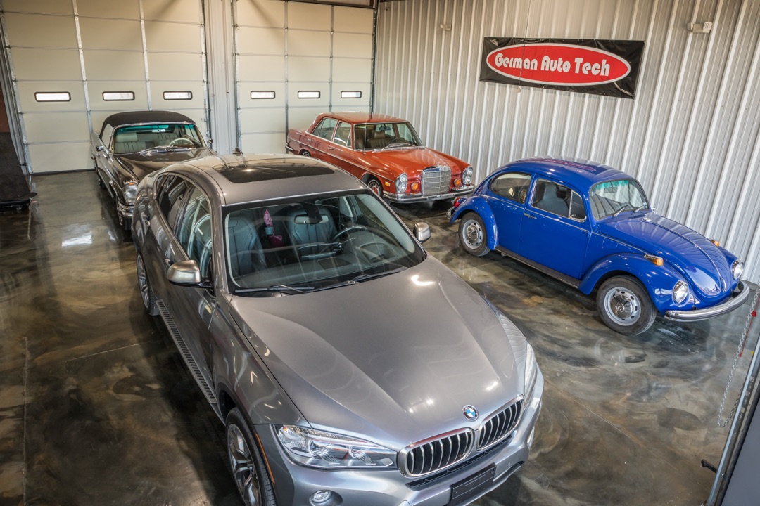 Classic Volkswagen and Mercedes vehicles at German Auto Tech